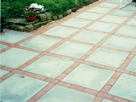 patio of mixed pcc flags with block pavers