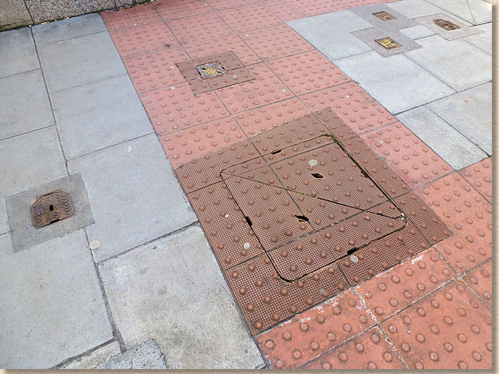 mix of concrete and surface-mounted tactiles in dublin