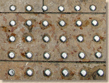 close up steel blister studs