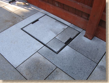 recess tray fitted into granite flagstones