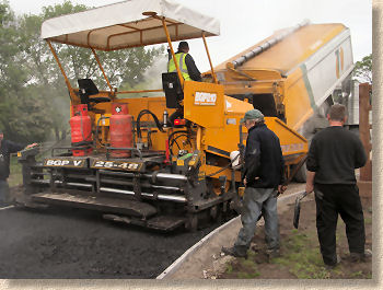 paver machine laying bitmac