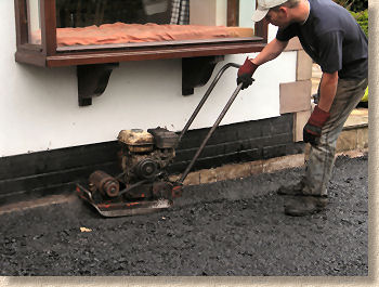 plate compactor on binder course