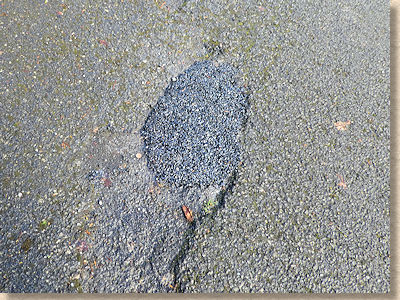 patched pothole