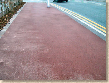 red macadam in wet and dry