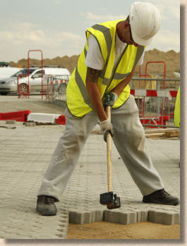 tightening blocks with paving hammer