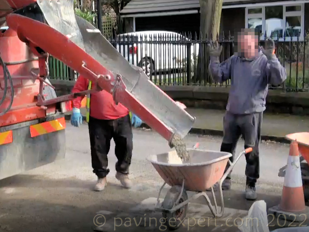 concrete being discharged from wagon