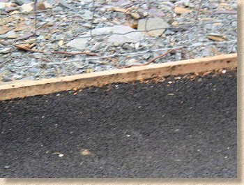 timber edging with tarmac