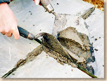 hand pointing flagstones