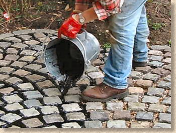 pouring molten pitch