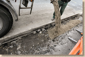 concrete is discharged into trench