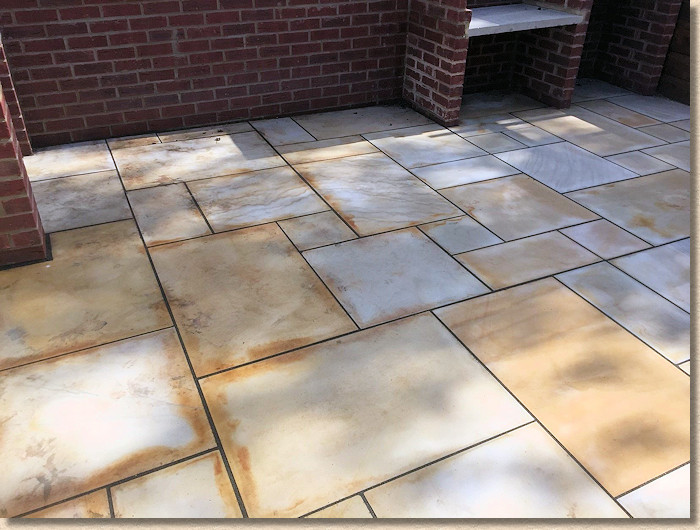 Faq Fixing Acid Stained Flagstones Setts And Other Paving Pavingexpert - How To Remove Rust Stains From Natural Stone Patio
