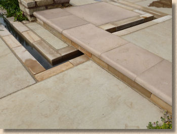 water feature with fairstone paving