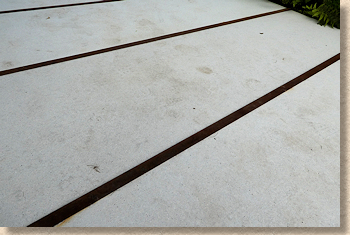 concrete plinth with steel strap