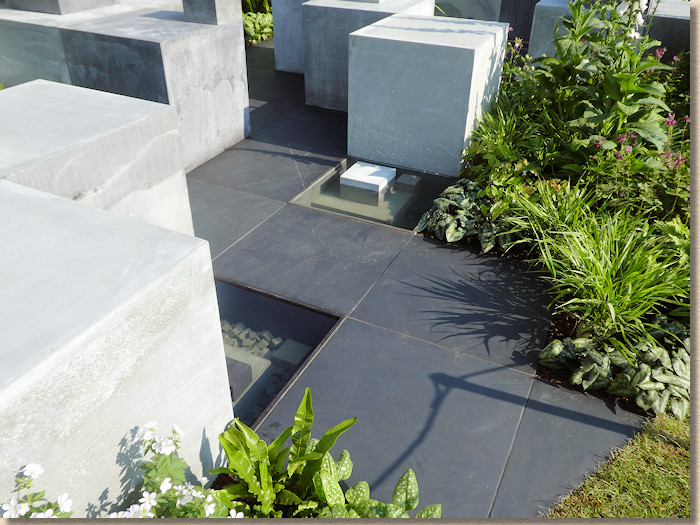 concrete blocks and black paving