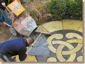 pour mixed mortar onto paving