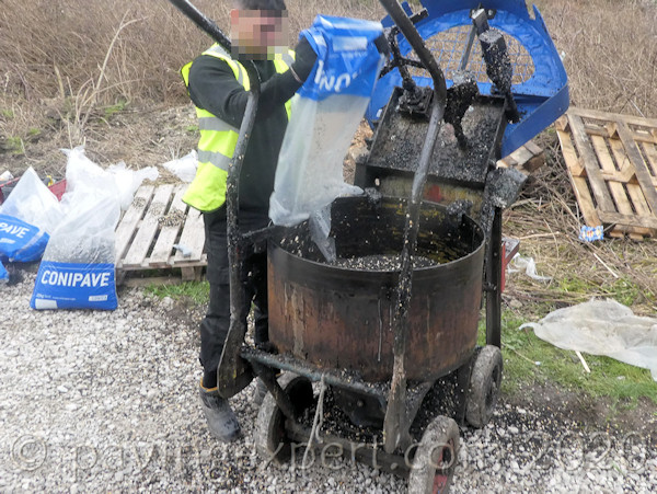 empty aggregate bags into mixer
