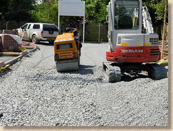 excavator and roller